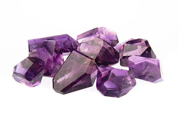 Amethyst polished freeforms High Quality Dark Amethyst highly polished freeforms. For crystal healing or ornamental use. amethyst stock pictures, royalty-free photos & images
