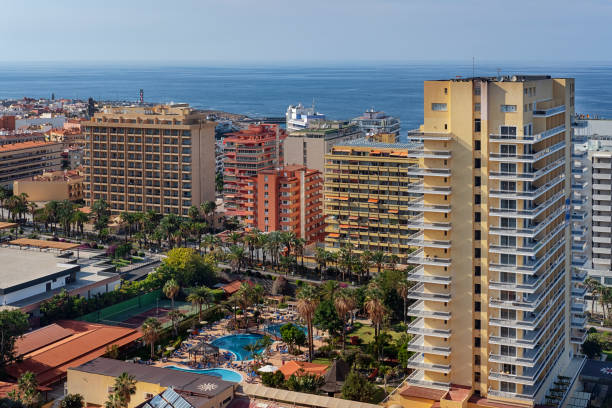 Ample elevated views towards the busiest tourism area in Puerto de la Cruz, Tenerife, Canary Islands, Spain stock photo
