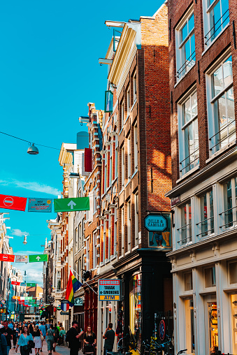 August 1st, 2020 – Amsterdam, Netherlands: Even during the Coronavirus, Amsterdam is still full of tourists and people on the street Nieuwendijk as you can see here in summer 2020.