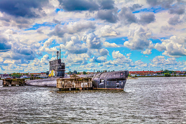 amsterdam old submarines Netherlands, Amsterdam - August 14, 2011: Old submarine on the NDSM-Werf, sponsored by the city, the artistic community called Kinetisch North, a center for underground culture. amsterdam noord stock pictures, royalty-free photos & images