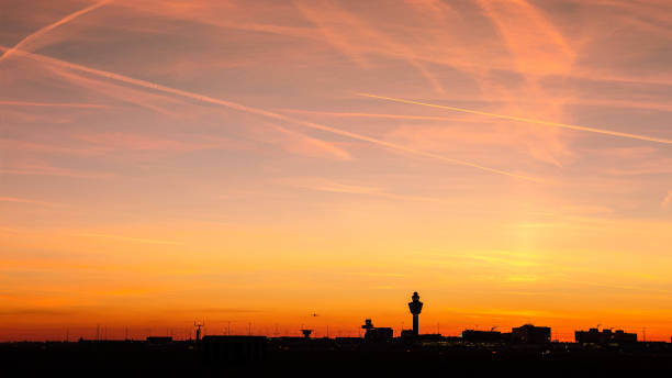 Amsterdam Schiphol airport sunset stock photo