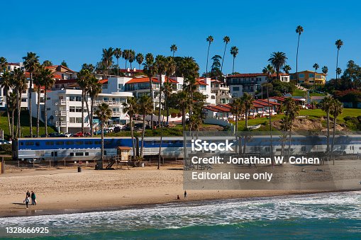 istock Amtrak's Pacific Surfliner, traveling south on the west coast through San Clemente, Southern California, on a cloudless, winter day. 1328666925