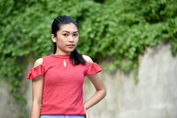 An A Serious Teen Girl A person in an outdoor setting philippine girl stock pictures, royalty-free photos & images