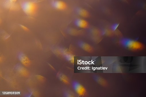 istock An abstract Dark purple-brown-yellow light effect stock illustrations with colored blurs for background 1358959309
