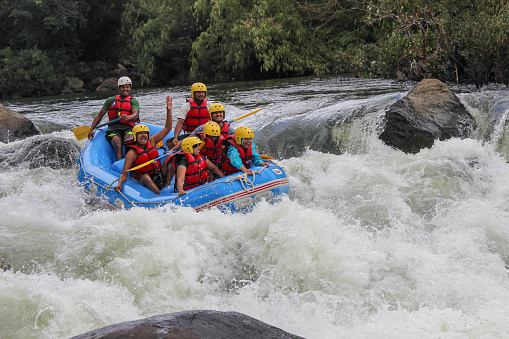 An Action captured in motion, river rafting in white waters is a popular adventure tourism for the brave hearted visiting Coorg in Karnataka,India.