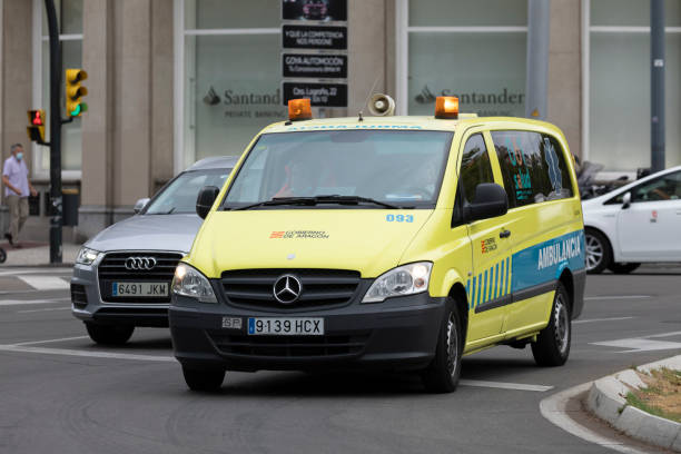An ambulance of the public health service, Zaragoza Zaragoza, Spain - August 18, 2020: An ambulance of the public health service of the Government of Aragon circulates urgently, along Paseo Sagasta, in the center of Zaragoza. public service stock pictures, royalty-free photos & images