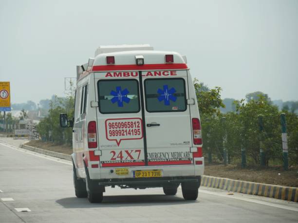 An ambulance vehicle travels along Yamuna Expressway. stock photo