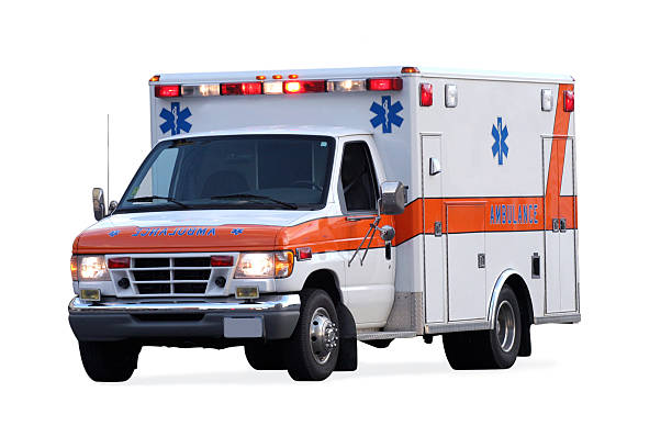 an ambulance with its lights on - ambulance stok fotoğraflar ve resimler