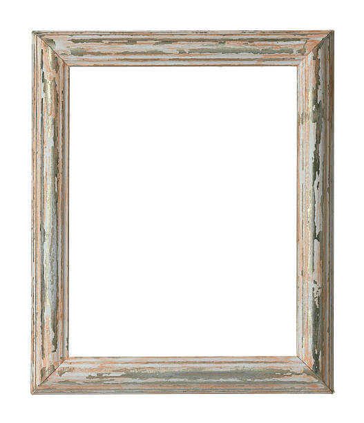 An empty weathered wooden frame on a white background stock photo