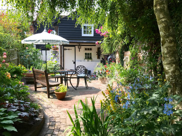 en engelsk cottage garden - tree of flower of life bildbanksfoton och bilder