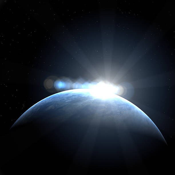 An image of sunrise over earth from space stock photo