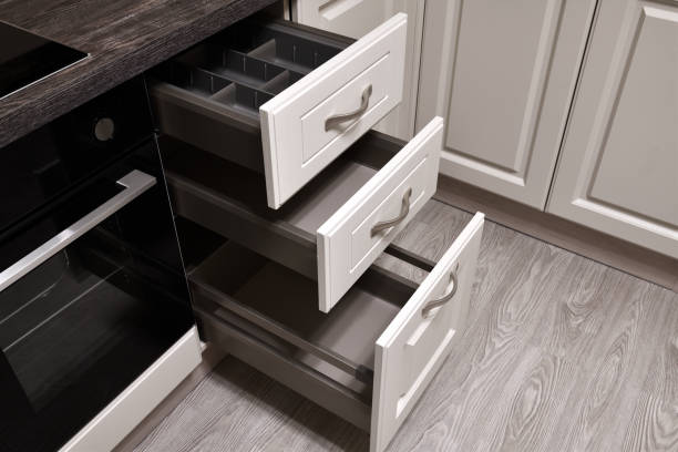 An open drawers in the kitchen table stock photo