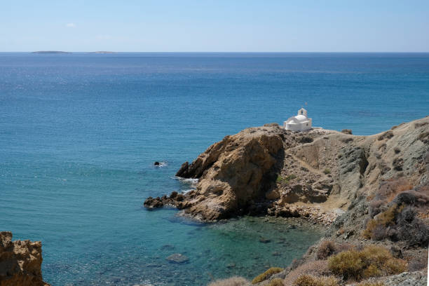 Anafi island - Wonderful view on the Anargyri coast, the eponymous small white church. Cyclades islands, Greece stock photo