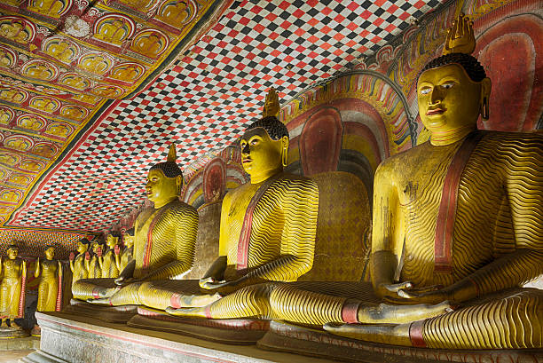 Ancient Buddha Statues in Dambulla Cave Temple, Sri Lanka Dambulla cave temple also known as the Golden Temple of Dambulla is situated in the central part of Sri Lanka. This temple complex dates back to the first century BCE. dambulla stock pictures, royalty-free photos & images