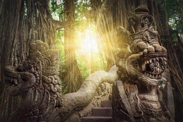 Ancient dragon sculptures on the bridge Ancient dragon sculptures on the bridge in monkey forest, Ubud, Bali, Indonesia indonesia photos stock pictures, royalty-free photos & images