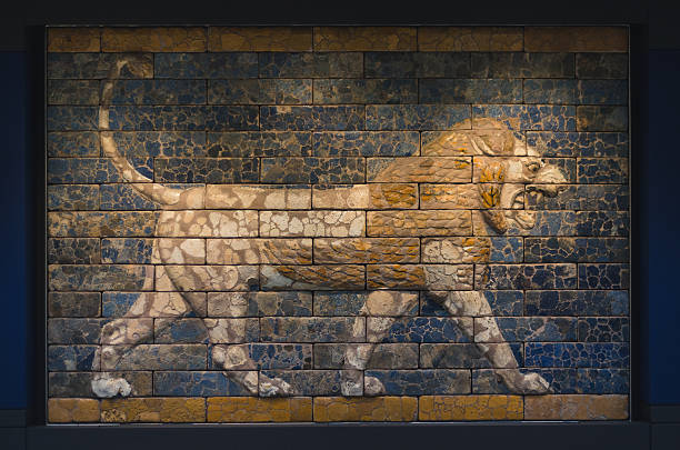 ancient lion on tiles stock photo