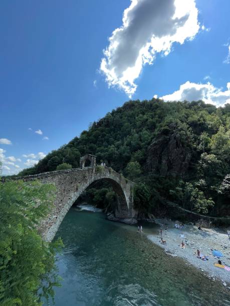 Ancient stone bridge in lanzo torinese italy stock photo
