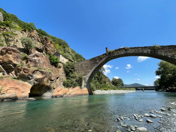 Ancient stone bridge in lanzo torinese italy stock photo