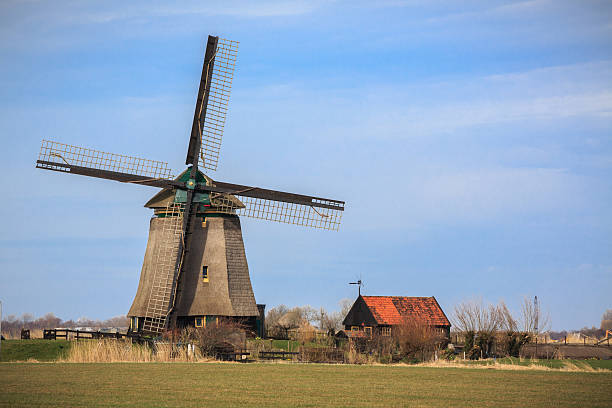 Ancient windmills still working in Holland stock photo