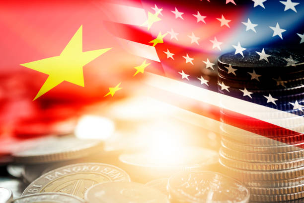 USA and China flag on coins stacking .It is symbol of economic tariffs trade war and tax barrier between United States of America and China.  china stock pictures, royalty-free photos & images