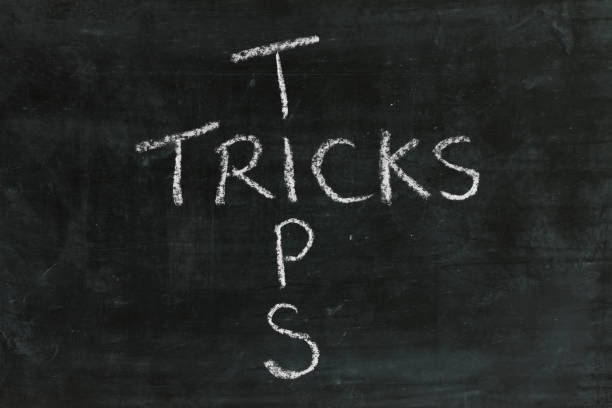 tips and tricks  words in blackboard - tips and tricks stockfoto's en -beelden