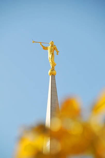 Angel Moroni A shot of the Angel Moroni statue atop the Spire of The Oquirrh Mountain Utah Temple. synagogue stock pictures, royalty-free photos & images