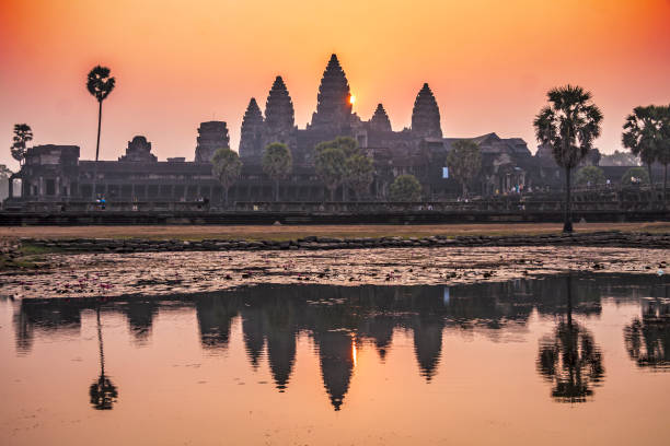 Angkor Wat at sunrise with pond reflection. Angkor, Cambodia stock photo