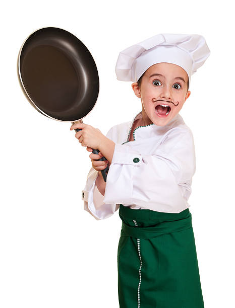 Angry cookee chief threaten by pan stock photo