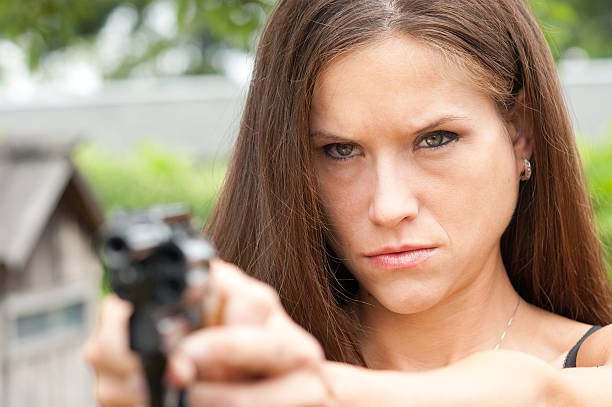 Female Holding Gun In Mouth Stock Photos Pictures Royalty Free