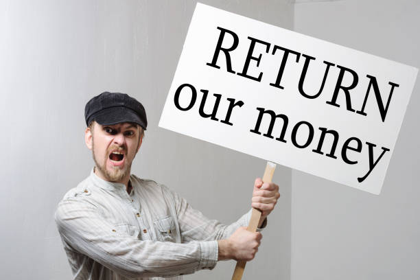 Angry protesting worker with protest sign inscription return our money Angry protesting worker with protest sign inscription return our money. rich strike stock pictures, royalty-free photos & images