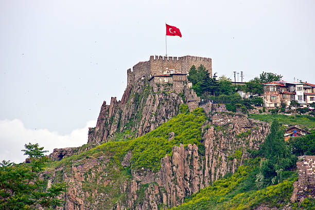 Ankara Castle Ankara, Turkey - May 22, 2016: Ankara Castle is a fortification from ancient or medieval era in Ankara, Turkey. The exact date of its construction is unknown. Having been controlled by Romans and Byzantines earlier; it was captured by Seljuq Turks in 1073, by Crusaders in 1101, who gave it back again to the Byzantine and again by Seljuqs in 1227. The castle saw extensive repair by the order of İbrahim Paşa in 1832 during the Ottoman era.The ramparts of the old Ankara citadel nowadays serves as historic museum, tourists like to walk her, Ankara. There is a clear city view of Ankara from castle hill. People who go to Ankara first see the castle. ankara turkey stock pictures, royalty-free photos & images