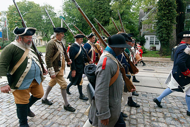 Annual Historic Revolutionary Germantown Festival, Northwest Philadelphia, PA Philadelphia, PA, USA - October 3, 2015; Revolution War era Re-enactors portraying American Militiamen, under Gen. Washington, are seen taking part in the annual Battle of Germantown re-enactment, part of the Revolutionary Germantown Festival, held on the grounds of Cliveden and Upsala, in Northwest Philadelphia, Pennsylvania. (photo by Bastiaan Slabbers) militia stock pictures, royalty-free photos & images