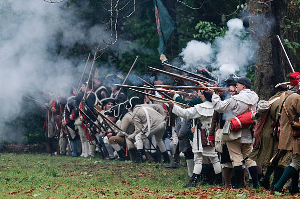 Annual Historic Revolutionary Germantown Festival, Northwest Philadelphia, PA Philadelphia, PA, USA - October 3, 2015; Revolution War era Re-enactors portraying American Militiamen, under Gen. Washington, are seen taking part in the annual Battle of Germantown re-enactment, part of the Revolutionary Germantown Festival, held on the grounds of Cliveden and Upsala, in Northwest Philadelphia, Pennsylvania. (photo by Bastiaan Slabbers) american revolution stock pictures, royalty-free photos & images
