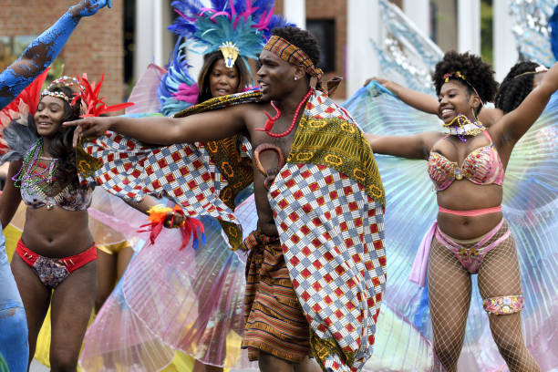 Philadelphia, PA, USA - June 23, 2018; Dancer with a carnival dance group from Trinidad perform during the annual Juneteenth parade in Center City Philadelphia, PA, on June 23, 2018. The Juneteenth Independence Day or Freedom Day commemorates the announcement of abolition of slavery on June 19, 1865.