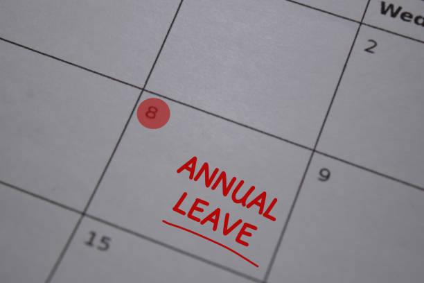 Annual Leave write on calendar. Date 8. Reminder or Schedule Concepts stock photo