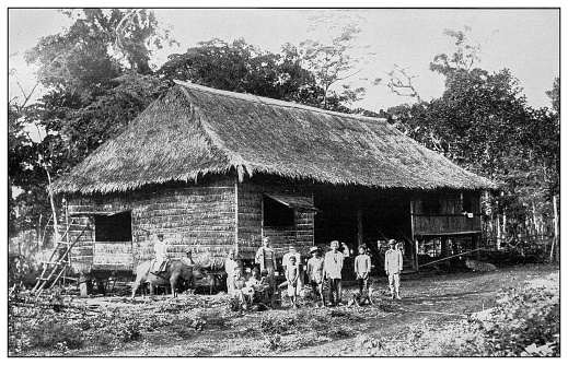 Antique black and white photograph of people from islands in the Caribbean and in the Pacific Ocean; Cuba, Hawaii, Philippines and others: Farmhouse, Luzon, Philippines