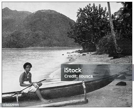 istock Antique black and white photograph: Samoan girl and canoe 1330229191