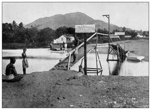 Antique black and white photograph: Toll bridge near Apia, Samoa Antique black and white photograph of people from islands in the Caribbean and in the Pacific Ocean; Cuba, Hawaii, Philippines and others: Toll bridge near Apia, Samoa apia samoa stock pictures, royalty-free photos & images