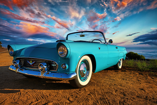 San Diego, California, United States -August 15th 2015: This is a close up photo of a baby blue 1956 Ford Thunderbird convertible car. This was the first two seat Ford since 1938. This image was shot on the bluff overlooking the Pacific Ocean in North county San Diego on a beautiful sunny day.