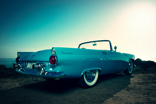 San Diego, California, United States -August 15th 2015: This is a close up photo of a baby blue 1956 Ford Thunderbird convertible car. This was the first two seat Ford since 1938. This image was shot on the bluff overlooking the Pacific Ocean in North county San Diego on a beautiful sunny day. 