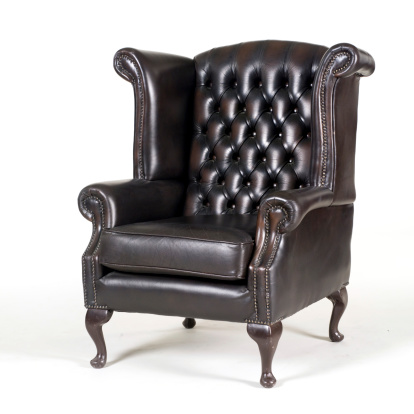 Antique brown leather armchair