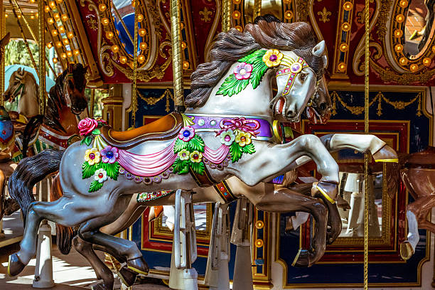 antique carousel merry go round horse old merry go round carousel against blue skyold merry go round carousel against blue sky carousel horses stock pictures, royalty-free photos & images