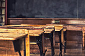 istock Antique Classroom Student Desks 471942491