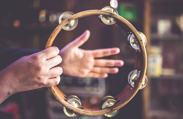 Antique collection of the wooden tambourine musical percussion. stock photo