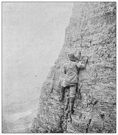 Antique dotprinted black and white photograph: Mountaineering climbing