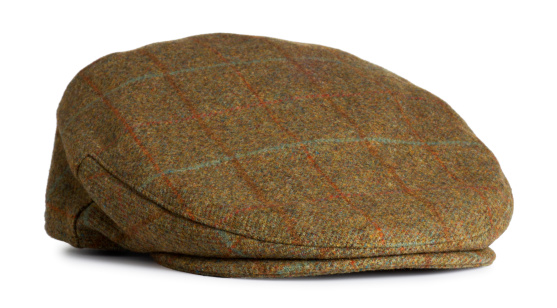This is a photo of a men's old fashioned felt driver cap. There is a clipping path included with this file.Click on the links below to view lightboxes.