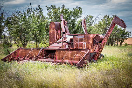 Antique Rusty Old Broken Down Combine Stock Photo - Download Image Now - iStock