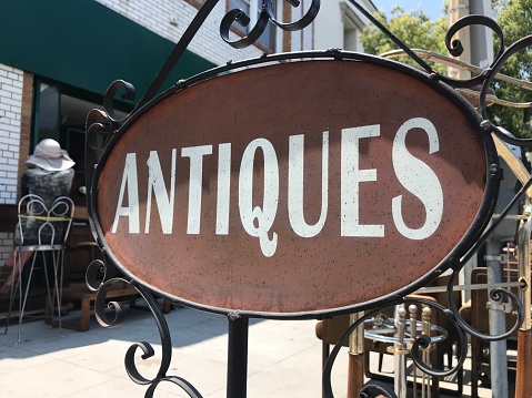 Antique Shopping Sign