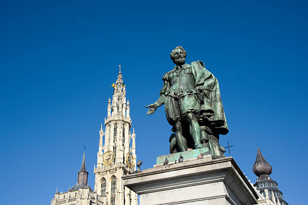 Antwerp &#8211; Rubens and the Cathedral The Bronze statue of the Flemish painter Peter Paul Rubens at the Groenplaats  (=Green place) in the very center of old Antwerp in front of the Cathedral of Our Lady (Dutch: Onze-Lieve-Vrouwekathedraal).  Willem Geefs (1805-1883) was the sculptor. The statue was erected in 1843. flanders belgium stock pictures, royalty-free photos & images