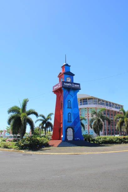 Apia Town Clock Tower during a sunny day. The Clock Tower is the center of Apia. It was constructed in memory to the fighters and to those who lost their lives in WW1. apia samoa stock pictures, royalty-free photos & images